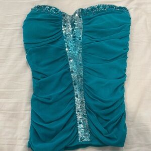 Strapless top, forever21. Size Medium. Used. Turquoise color.